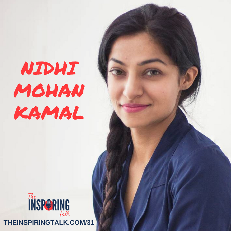 Nidhi Mohan Kamal smiling on blue top